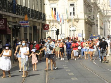 Lizbon 'daki Comercio Meydanı' nda Portekiz 'de yaşayan göçmenler protesto ediyor. 11 Temmuz 2021, Lizbon, Portekiz: Portekiz 'de yaşayan göçmenler Lizbon' daki Comercio Meydanı 'nda bir gösteri düzenlediler.