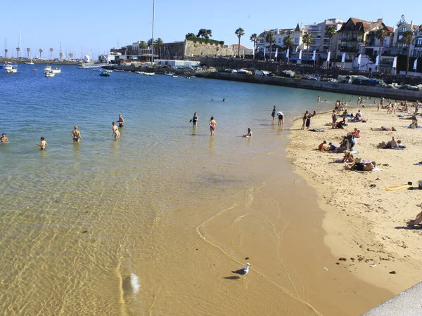 Bathers movement on Ribeira beach, in Cascais. July 29, 2021, Cascais, Portugal: Sunny day with pleasant temperature takes bathers to Ribeira beach, which is in center of Cascais, in metropolitan region of Lisbon, on Thursday (29).  