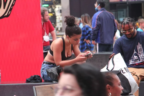  NYPD arrest a man who shouts shame on you at naked entertainers at Time Square. July 29, 2021, New York, USA: A man who was shouting shame on you at naked female entertainers and cowgirl for their exposition at Times Square 