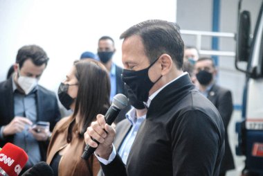 (Sao Paulo Sağlık Bakanlığı 'na teslim edilen 66.8 milyon Butantan aşısına ulaştı. 9 Ağustos 2021, Sao Paulo, Brezilya: Sao Paulo valisi Joao Doria (PSDB), Nat için iki milyon doz Coronavac aşısı salınımına eşlik eder.