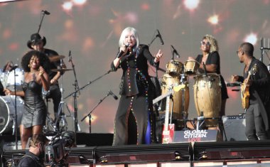 (Tina Turner, New York 'taki Global Citizen Live' da sahne alıyor. 25 Eylül 2021, New York, ABD: The Global Citizen Live New York Central Park çimlerinde Tina Turner ve Jon Batiste 'in müzikli performanslarıyla hayranların keyfine göre piyanoda