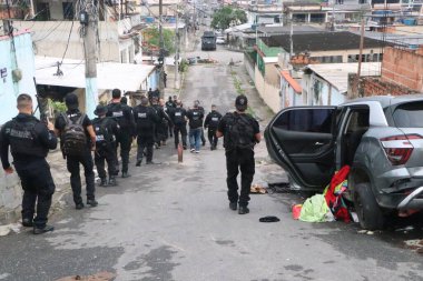 Rio de Janeiro (RJ), 10 / 28 / 25 - Penha ve Alemao komplekslerindeki 2 bin 500 polis memurunun desteğiyle bu Salı günü, 28 Ekim 2025 tarihinde, kaçakçılık ve araç hırsızlığıyla mücadele edildi. (Jos Lucena / Newws2)