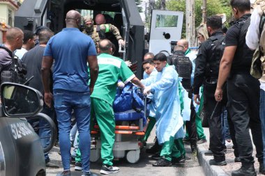 Rio de Janeiro (RJ), Brezilya 10 / 28 / 25 - Penha ve Alemao komplekslerinde gerçekleştirilen operasyon sırasında çekilen görüntüler, Penha Mahallesi 'ndeki Getulio Vargas Hastanesi' ne bu Salı, 28 Ekim 2025. (Jos Lucena / Yeniler 2)