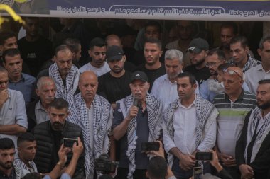 Filistinliler, Filistinli lider Yaser Arafat 'ın Gazze' deki El Azahr Üniversitesi 'nde ölümünün 21. yıldönümü münasebetiyle düzenlenen törene katıldılar. Gazze, Filistin, 11 Kasım 2025. (hashem zimmo / the newws2)