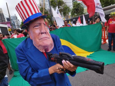 Sao Paulo (SP), Brezilya 5 Ocak 2026 Sao Paulo 'da ikamet eden Venezuelalılar ve sol partilerle, sosyal hareketlerle ve sendikalarla bağlantılı eylemciler, ABD Konsolosluğu (leandro chemalle / theenews2)