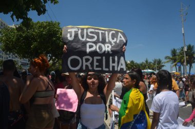 Rio de Janeiro (RJ), Brezilya 01 / 02 / 2026 - Yüzlerce gösterici köpek Kulak 'ın zalimce ölümü için adalet protestosu düzenledi. Birkaç düzine gösterici Flamengo Parkı boyunca Copacabana Sahili 'ne yürüdü (fausto maia / the new ws2)