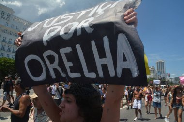 Rio de Janeiro (RJ), Brezilya 01 / 02 / 2026 - Yüzlerce gösterici köpek Kulak 'ın zalimce ölümü için adalet protestosu düzenledi. Birkaç düzine gösterici Flamengo Parkı boyunca Copacabana Sahili 'ne yürüdü (fausto maia / the new ws2)