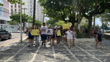 Guaruja (SP), Brezilya 01 / 02 / 2026 - Brezilya ve Guaruja 'da halk adaletin yerini bulması için Praca das Bandeiras' ta bir etkinlik düzenledi. (Oslaim Brito / Tenews2)