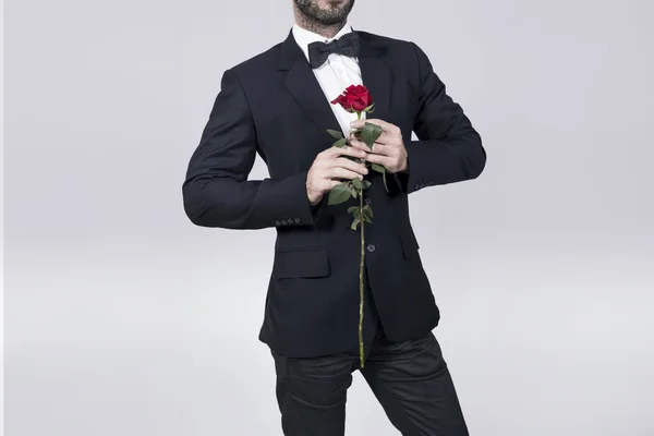 Pflegt Mann mit einer Rose — Stockfoto