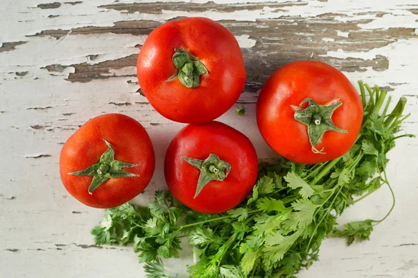 Red tomatoes on a table — Stock Photo, Image