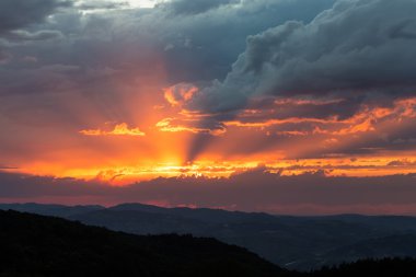 fiery red sunset in the clouds