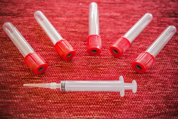 Syringe , needle and blood tube — Stock Photo, Image