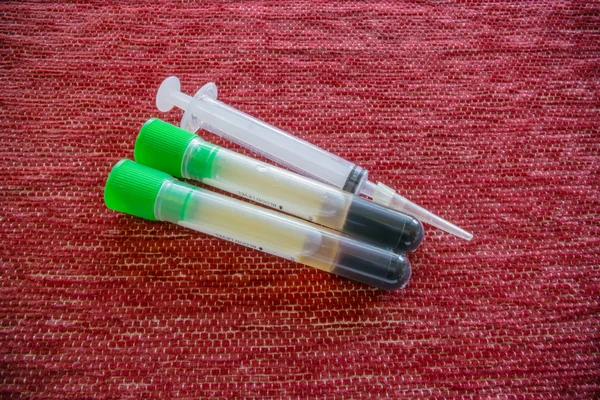 Syringe , needle and blood tube — Stock Photo, Image