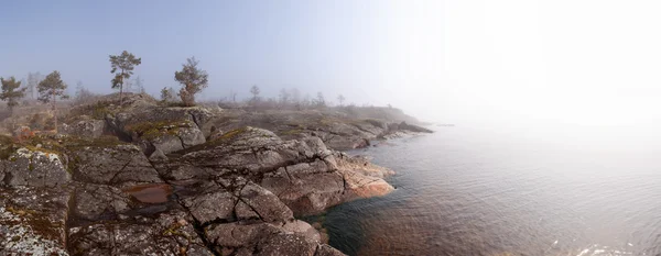 Fog on stony coast — Stock Photo, Image