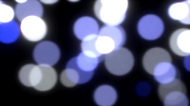 Spadające iskry światła zwolnionym niewyraźne streszczenie tło niebieskie — Wideo stockowe