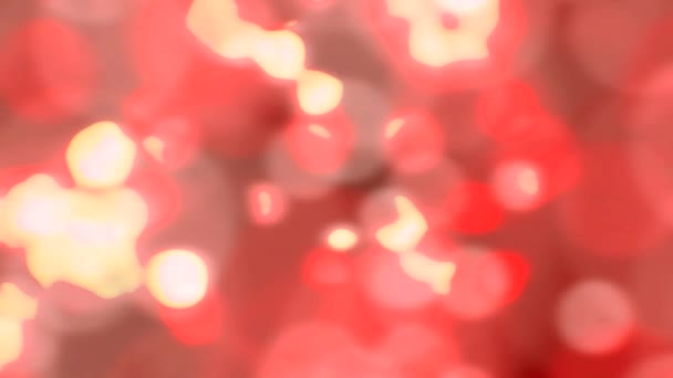 Funkelndes Licht funkt Zeitlupe defokussiert abstrakten Hintergrund rote Schleife — Stockvideo