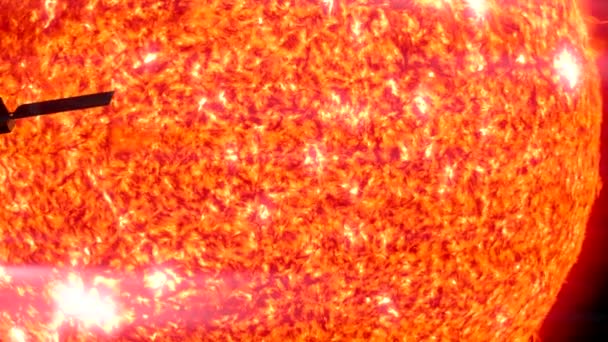 Satellite passes the sun in silhouette — Stock Video