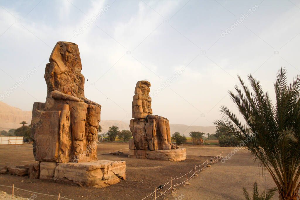 Famous colossi of Memnon, giant sitting statues, Luxor, Egypt