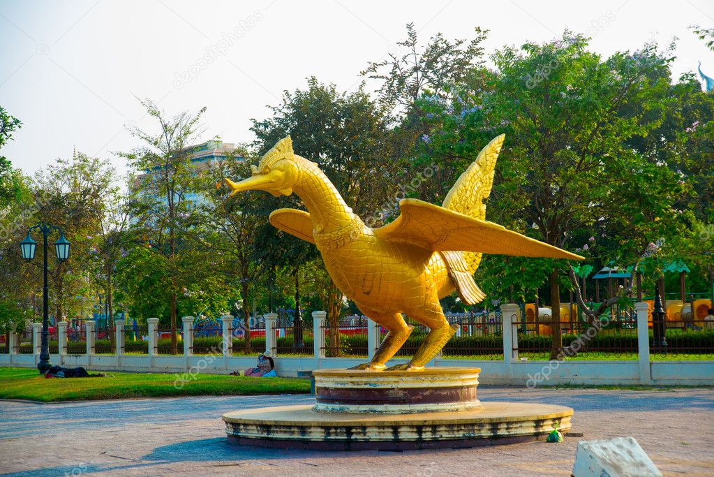 Huge Golden sculpture of a bird. Phnom Penh, Cambodia.