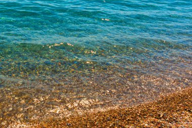 ANTALYA, TURKEY: Türkiye 'nin Antaly kentindeki Konyaalti plajında güzel kum ve deniz dokusu.