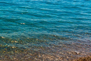 ANTALYA, TURKEY: Türkiye 'nin Antaly kentindeki Konyaalti plajında güzel kum ve deniz dokusu.