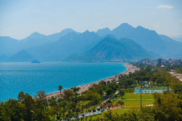 stock image ANTALYA, TURKEY: Bird's-eye view of Konyaalti beach and the Mediterranean Sea and mountains in summer in Antalya.