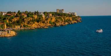 ANTALYA, TURKEY: Türkiye 'nin Antalya kentinde güneşli bir yaz gününde Atatürk Parkı' ndan deniz ve şehir manzarası.