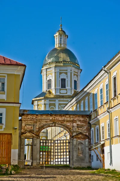 An ancient monastery of the yellow color in Russia Royalty Free Stock Photos