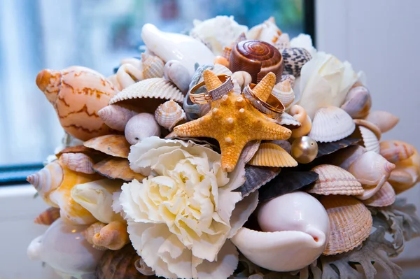 Very beautiful engagement ring and shells — Stock Photo, Image