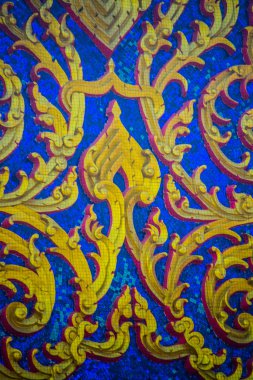 Altın süs mavi zemin üzerine tapınak üzerinde. Hua Hin.Thailand.