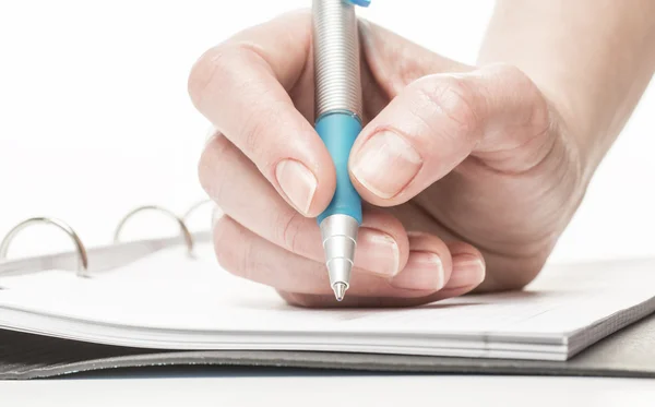 Escritura a mano femenina en cuaderno —  Fotos de Stock