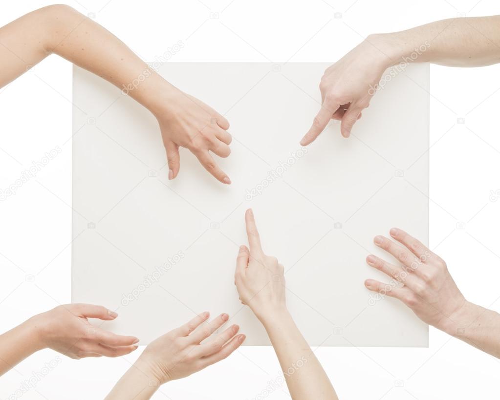 Human hands holding white board