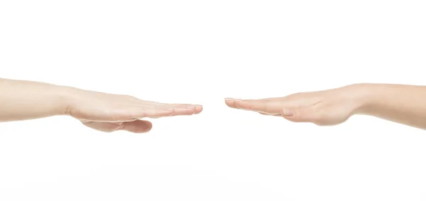 Two different female hands reaching to each other — Stock Photo, Image