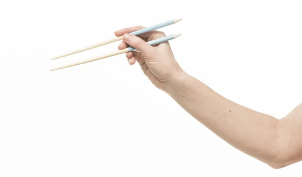 El tutma chopsticks — Stok fotoğraf
