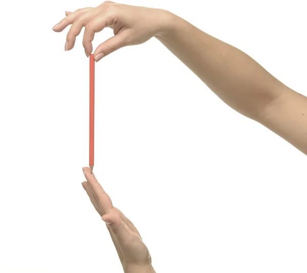 Female hand holding a pencil — Stock Photo, Image