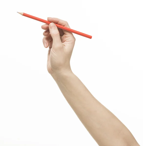 Mão feminina segurando um lápis Imagem De Stock