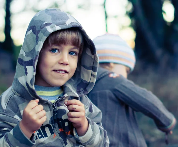 Small smiling boy in a hoodie — Stock Photo, Image