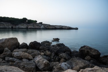 Bulanık deniz Dalış, uzun pozlama taşlara