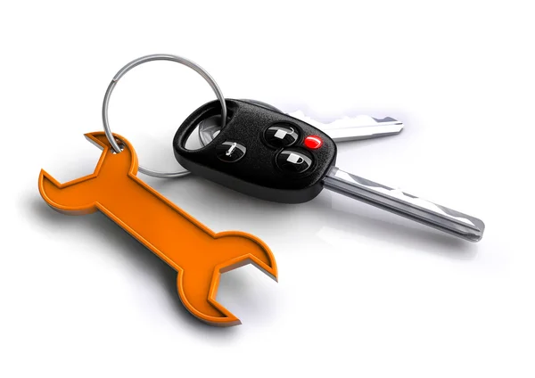 Autosleutels met moersleutel pictogram als keyring — Stockfoto