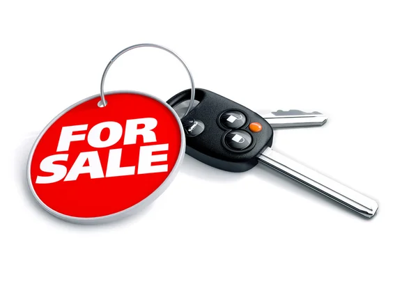 Arabanın anahtarlarını Anahtarlık ve satılık araba — Stok fotoğraf