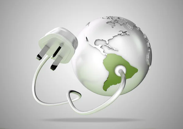 Electrical cable and plug connects power to South America on a world globe. Concept for how Brazil and Argentina consume electricity and energy and how they need to use renewable, green, alternative energy solutions like solar & wind turbine energy.
