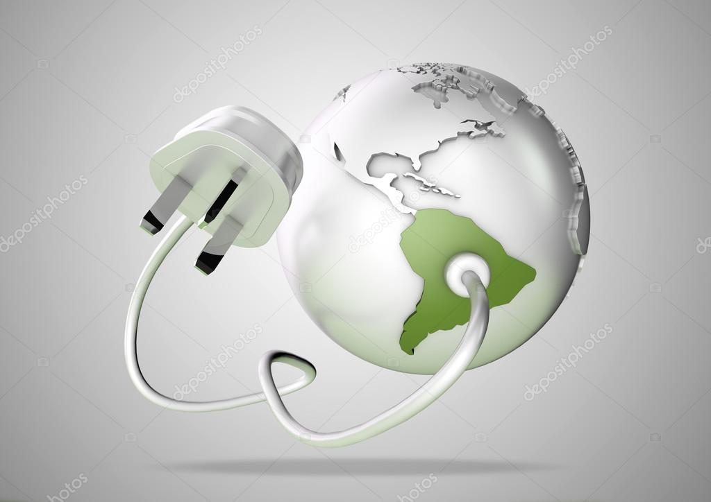 Electrical cable and plug connects power to South America on a world globe. Concept for how Brazil and Argentina consume electricity and energy and how they need to use renewable, green, alternative energy solutions like solar & wind turbine energy.
