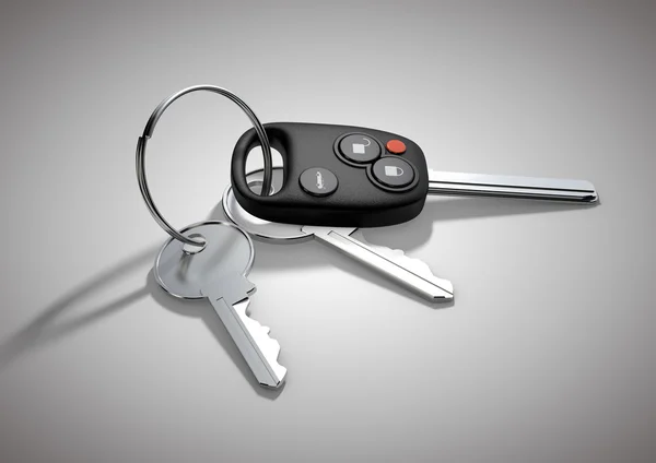 Modern Car keys for passenger vehicle isolated on flat white sur