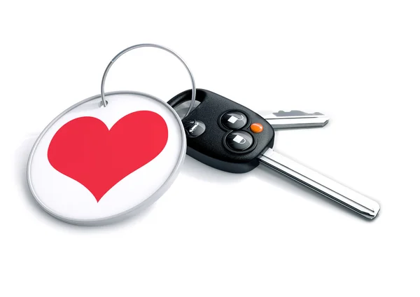 Set of car keys with keyring and red heart icon. Concept for how — Stockfoto