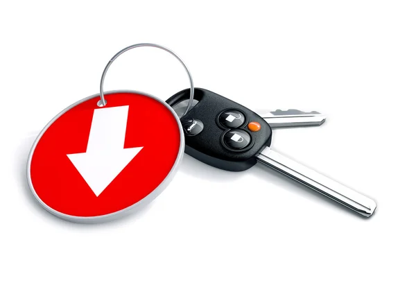Set of car keys and keyring isolated on white with arrow on red 