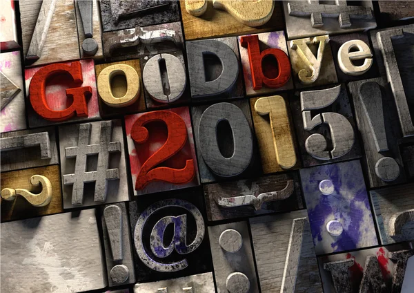 Tinta salpicada imprimiendo bloques de madera diciendo adiós al año 2015 mientras damos la bienvenida al nuevo año de 2016 — Foto de Stock