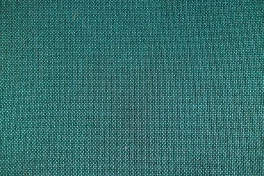 Mavi sandalyedeki fotoğraftaki kumaşın dokusu.