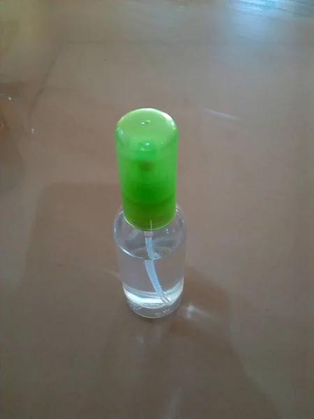 Desinfectante Manos Botella Con Cabeza Verde Foto —  Fotos de Stock