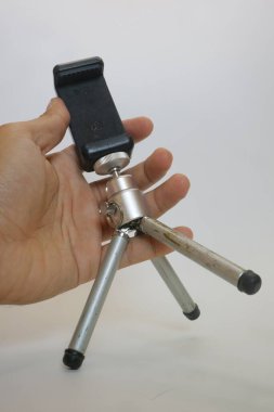 Kamera ya da akıllı telefon fotoğrafı için beyaz gri ya da mini tripod