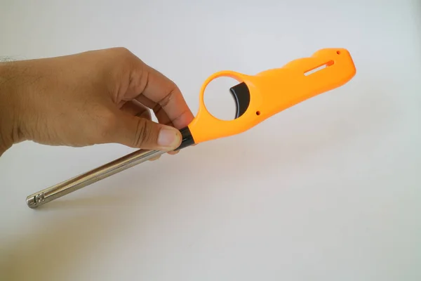 Orange Color Long Neck Gas Lighter Photo — Stock Photo, Image